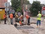Litouwen: Met zes man wordt een stukje asfalt gedicht - P1_Litouwen_0189.jpg - Copyright : Ronald van der Veer (http://www.veeronline.nl)